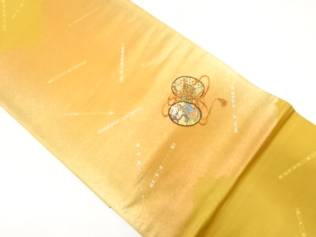 引き箔鼓に横笛模様織り出し袋帯